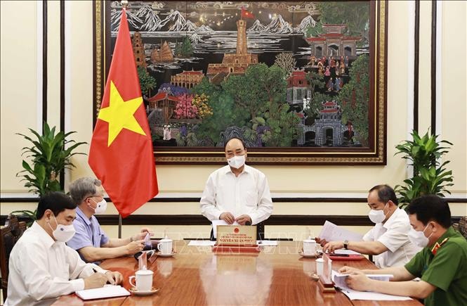 Chủ tịch nước Nguyễn Xuân Phúc phát biểu chỉ đạo tại cuộc họp. Ảnh: TTXVN