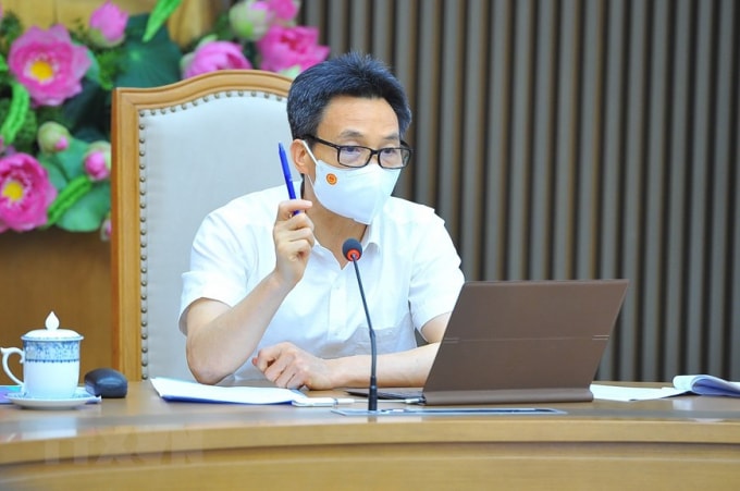 Phó Thủ tướng Chính phủ Vũ Đức Đam, Trưởng Ban Chỉ đạo Quốc gia phòng, chống dịch COVID-19 chủ trì cuộc họp. Ảnh: TTXVN