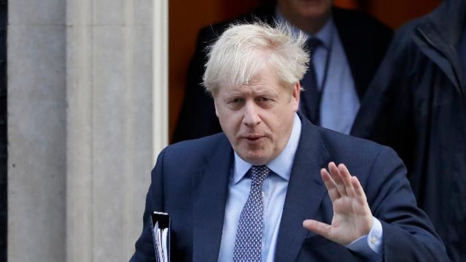 Thủ tướng Anh Boris Johnson hoãn gỡ các hạn chế phong tỏa COVID-19 - Ảnh: AFP