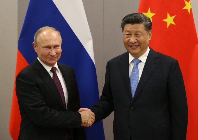 Tổng thống Putin (trái) và Chủ tịch Trung Quốc Tập Cận Bình - Ảnh: Getty