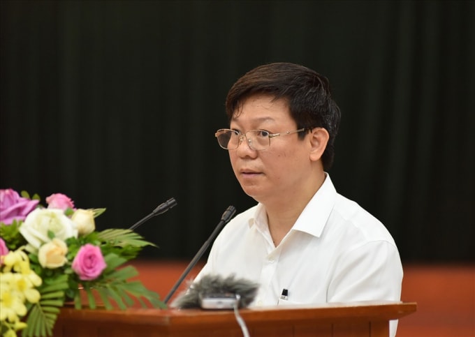 Vụ trưởng Vụ Báo chí - Xuất bản (Ban Tuyên giáo Trung ương) Trần Thanh Lâm báo cáo về công tác chỉ đạo, quản lý báo chí, xuất bản 6 tháng đầu năm 2021. Ảnh: Phạm Đông