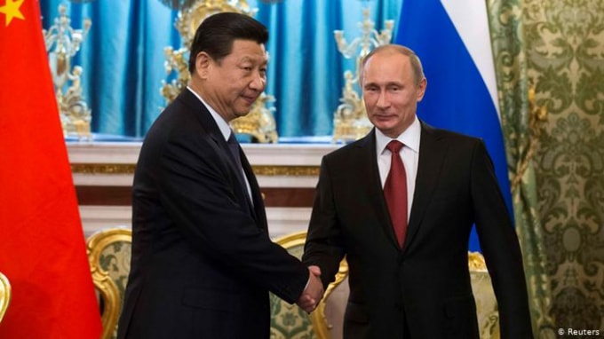 Chủ tịch Trung Quốc Tập Cận Bình (trái) và Tổng thống Nga Vladimir Putin - Ảnh: Reuters