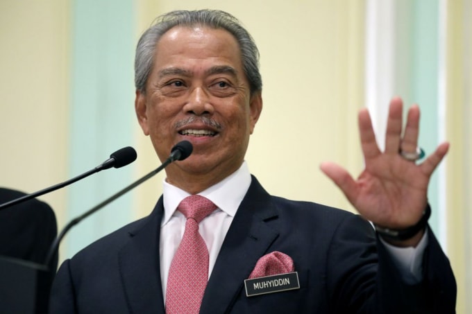 Thủ tướng Malaysia Muhyiddin Yassin phát biểu trong một cuộc họp báo ở Putrajaya, Malaysia ngày 11 tháng 3 năm 2020. @ REUTERS / Lim Huey Teng