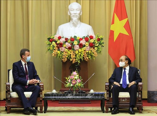 Chủ tịch nước Nguyễn Xuân Phúc tiếp Bộ trưởng Thương mại, Du lịch và Đầu tư Australia Dan Tehan, ngày 13/7. Ảnh: TTXVN