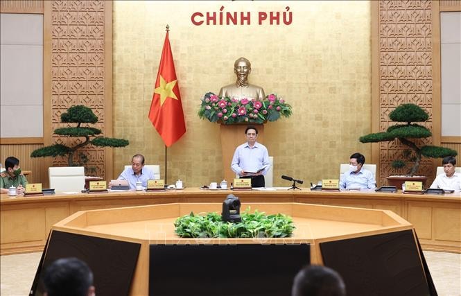 Thủ tướng Phạm Minh Chính phát biểu tại một cuộc họp của Chính phủ với Ban Chỉ đạo Quốc gia phòng, chống COVID-19. Ảnh: Dương Giang/TTXVN