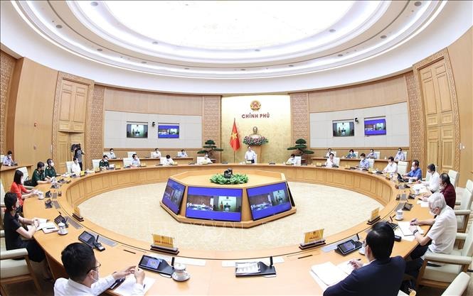 Quang cảnh cuộc họp tại Trụ sở Chính phủ. (Ảnh: TTXVN)