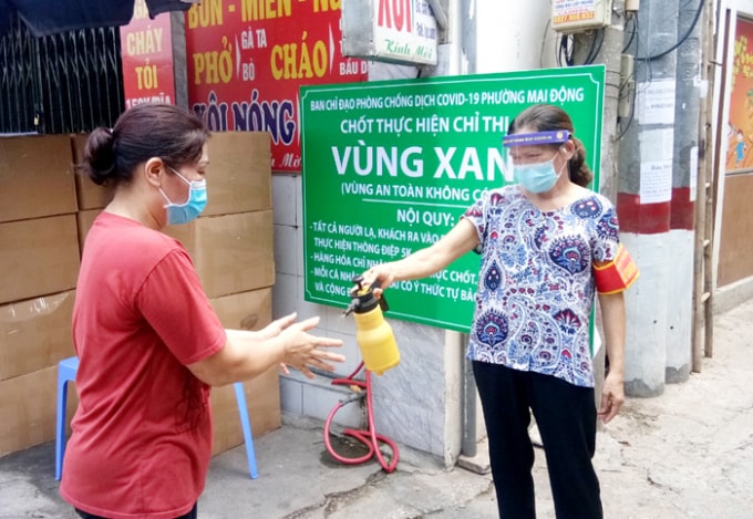 Phát huy sức mạnh cộng đồng trong phòng, chống dịch Covid-19. Ảnh: Trọng Toàn