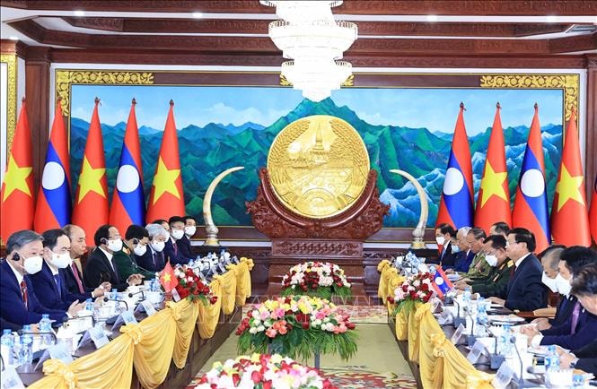 Chủ tịch nước Cộng hòa Xã hội chủ nghĩa Việt Nam Nguyễn Xuân Phúc hội đàm với Tổng Bí thư, Chủ tịch nước Lào Thongloun Sisoulith. (Ảnh: TTXVN)