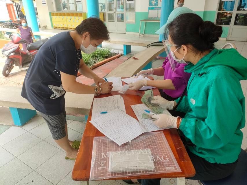 TP.Hải Phòng hỗ trợ 2 triệu đồng mỗi hộ dân đang ở TP.HCM. Ảnh: tienphong.vn