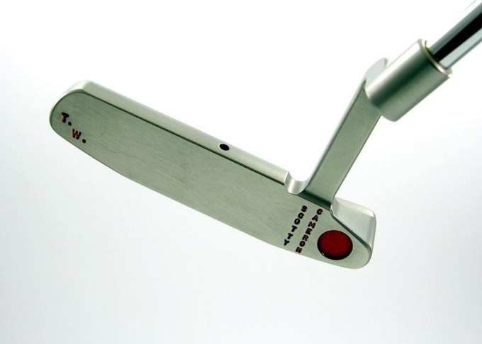 chiec gay gat du phong cua tiger woods dat hon xe ferrari hinh 1