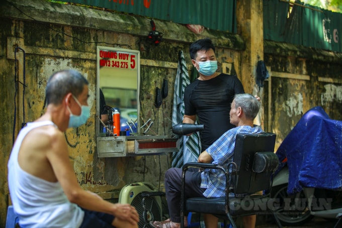 nguoi dan ha noi un un di cat toc ngay sau khi chi thi moi co hieu luc hinh 8