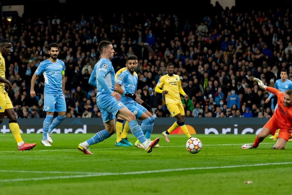 man city tien sat tam ve vao vong 1 8 champions league hinh 2