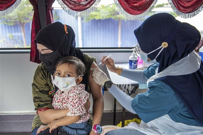 malaysia tam dung xac dinh covid 19 la benh dac huu hinh 1