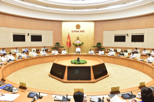 nhin lai nam 2021 chinh phu vuot gian lao trong bao dich covid 19 hinh 1