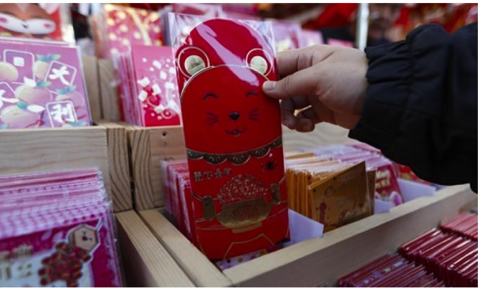 trung quoc tang hong bao khuyen khich nguoi lao dong khong ve que don tet hinh 1