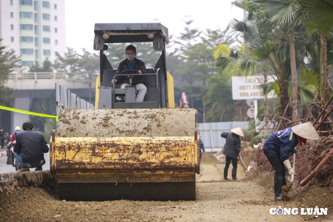 ha noi mo rong duong hoang quoc viet len 8 lan xe hinh 2