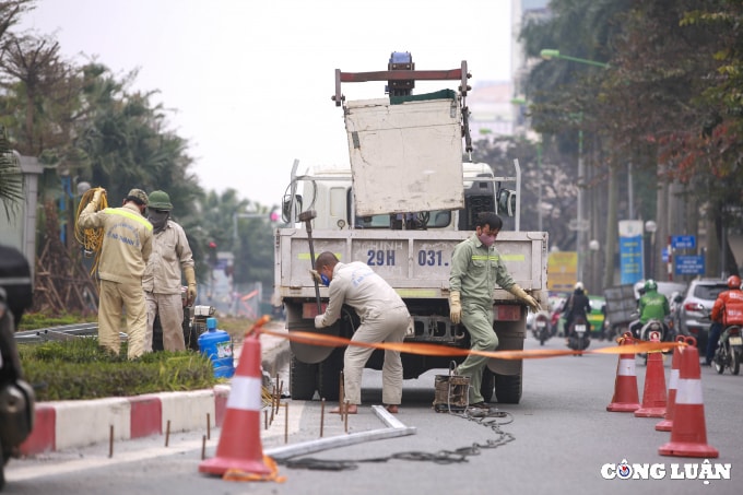 ha noi mo rong duong hoang quoc viet len 8 lan xe hinh 7