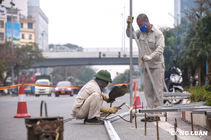 ha noi mo rong duong hoang quoc viet len 8 lan xe hinh 9