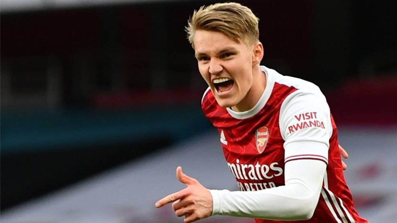 martin odegaard nguoi giup arsenal thang hoa tai ngoai hang anh hinh 1