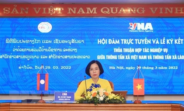 hop tac thiet thuc hieu qua giua thong tan xa viet nam va thong tan xa lao hinh 2