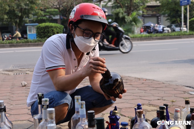 nghe buon vo chai ruou tay mua cua nguoi chan ban cho nguoi can hinh 4