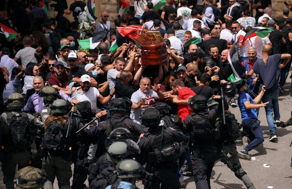 bao luc xay ra trong dam tang cua nu nha bao palestine hinh 1