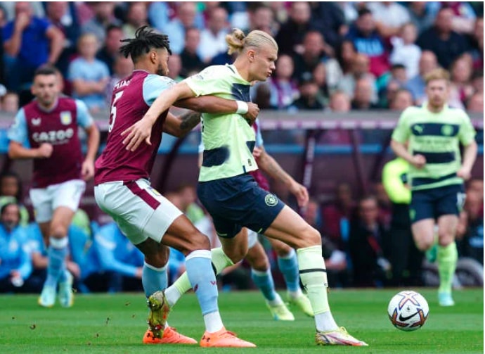 haaland ruc sang nhung man city van bi aston villa chia diem hinh 2