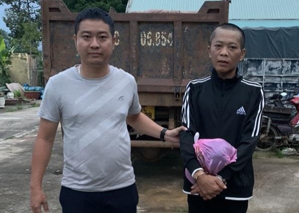 bat doi tuong truy na sau gan 9 nam lan tron hinh 1