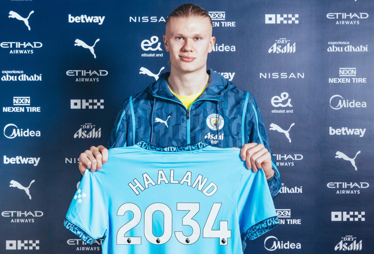 erling haaland ky hop dong 9 nam ruoi voi man city hinh 1