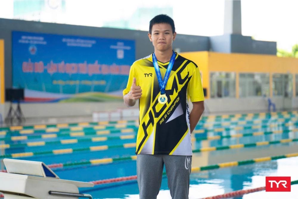 03-huynh-quoc-bao-tp.-hcm-lap-ky-luc-moi-noi-dung-400m-vhcv.jpg