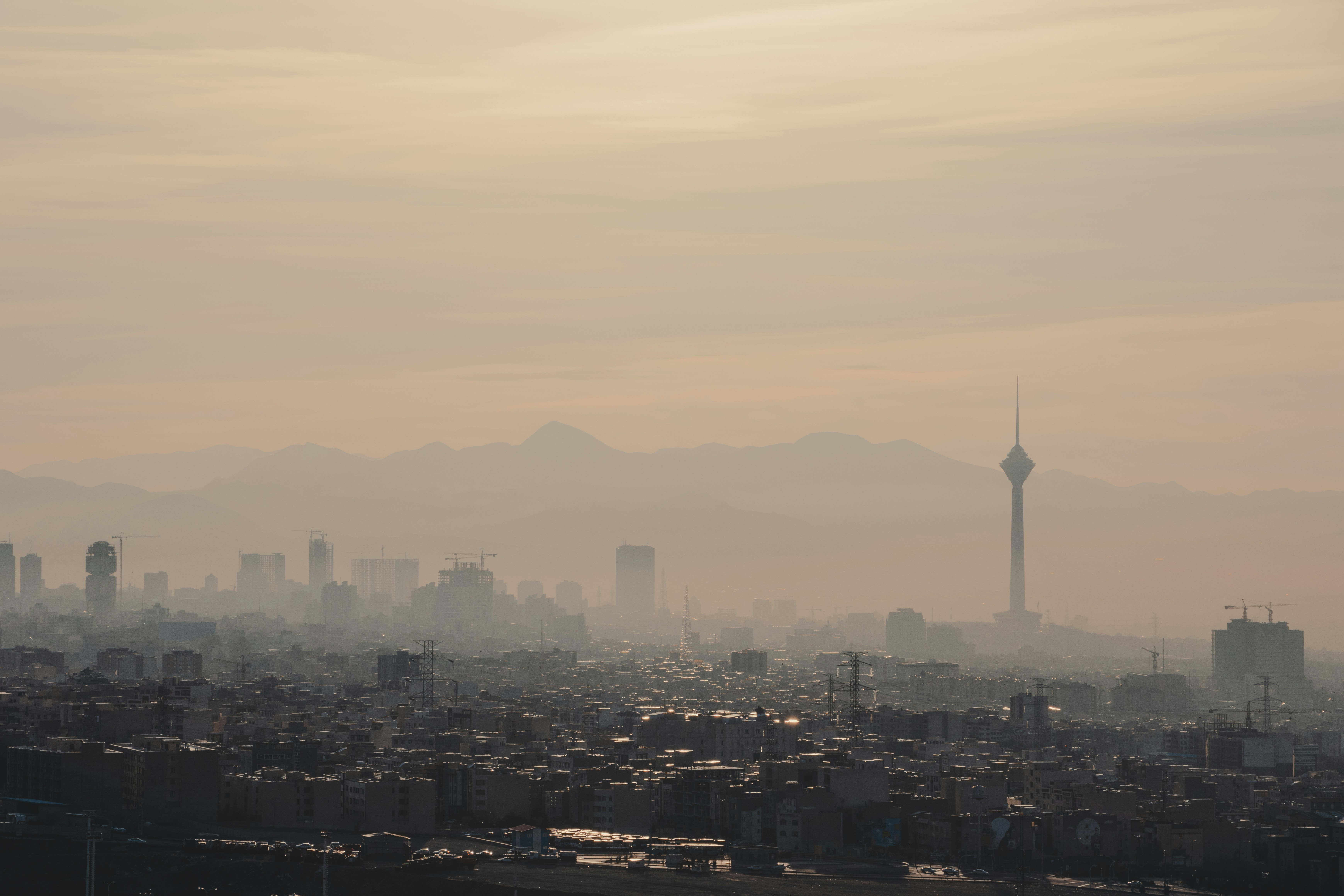 city skyline under white sky during daytime