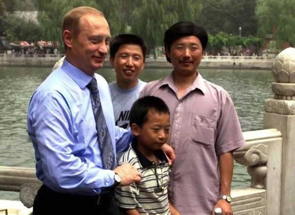 Peng Pai pictured with President Putin’s hands resting on his shoulders a quarter of a century ago in a Beijing park. Photo: handout
