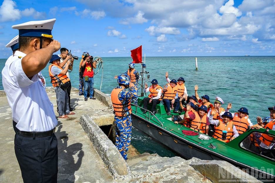 A group of people on a boat AI-generated content may be incorrect.