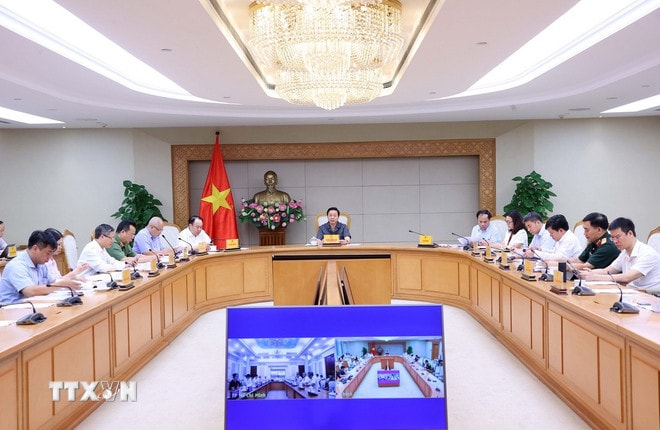 ttxvn-thu-tuong-tran-hong-ha-hop-ve-phat-trien-nha-o-xa-hoi-8295601.jpg