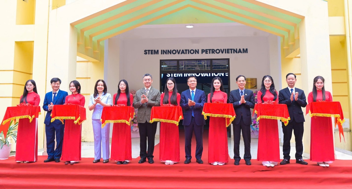 A group of people standing on a red carpet AI-generated content may be incorrect.