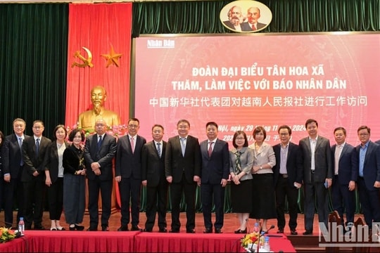 Báo Nhân Dân và Tân Hoa Xã thúc đẩy giao lưu, hợp tác