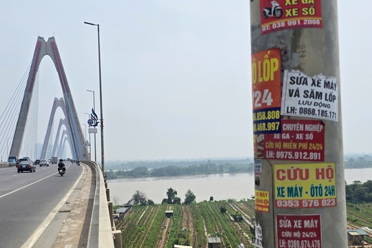 Luật sư kiến nghị xử lý nghiêm hành vi 'bôi bẩn' cầu Nhật Tân bằng quảng cáo trái phép