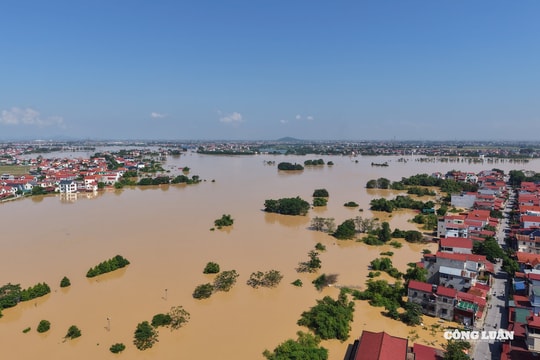 Nước sông Cầu dâng cao đe dọa người dân 2 bên bờ