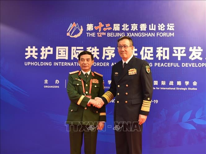 Đại tướng Phan Văn Giang gặp song phương và tiếp xúc bên lề Diễn đàn Hương Sơn Bắc Kinh lần thứ 12